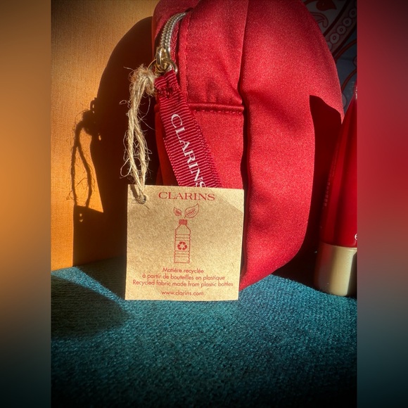 Clarins Vibrant Red Cosmetic Bag with Skincare Essentials - Picture 2 of 6
